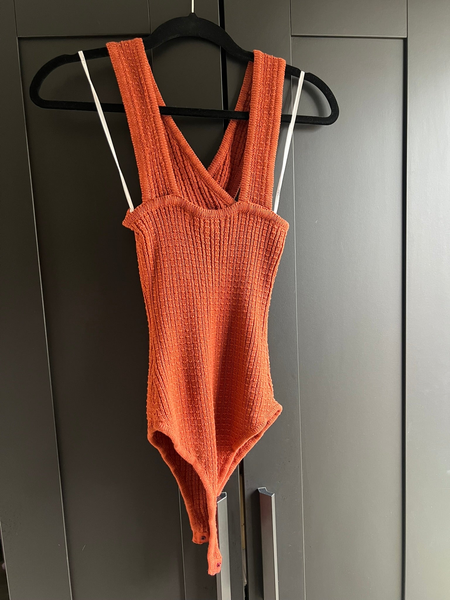 Orange knit criss-cross front bodysuit