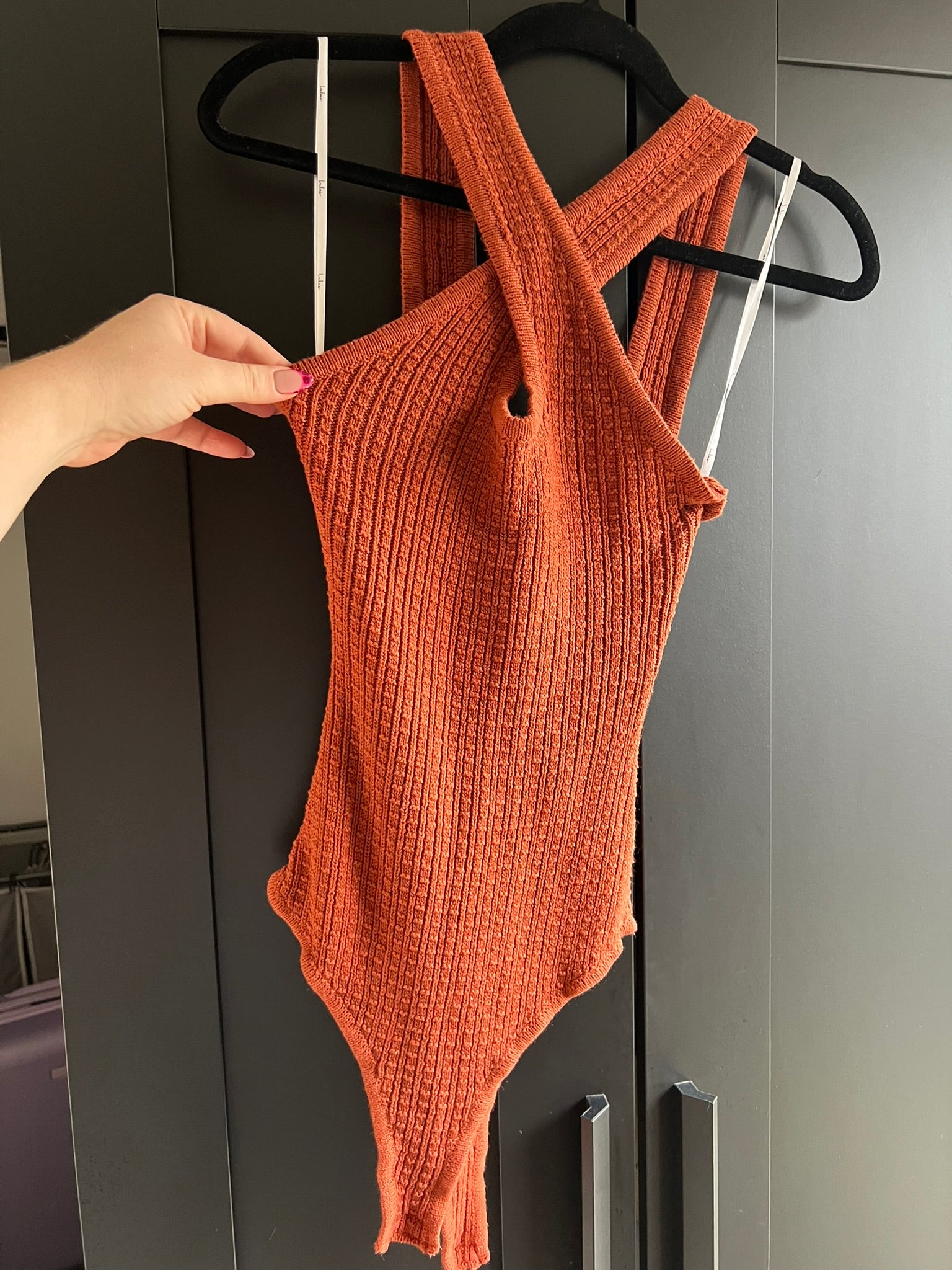 Orange knit criss-cross front bodysuit
